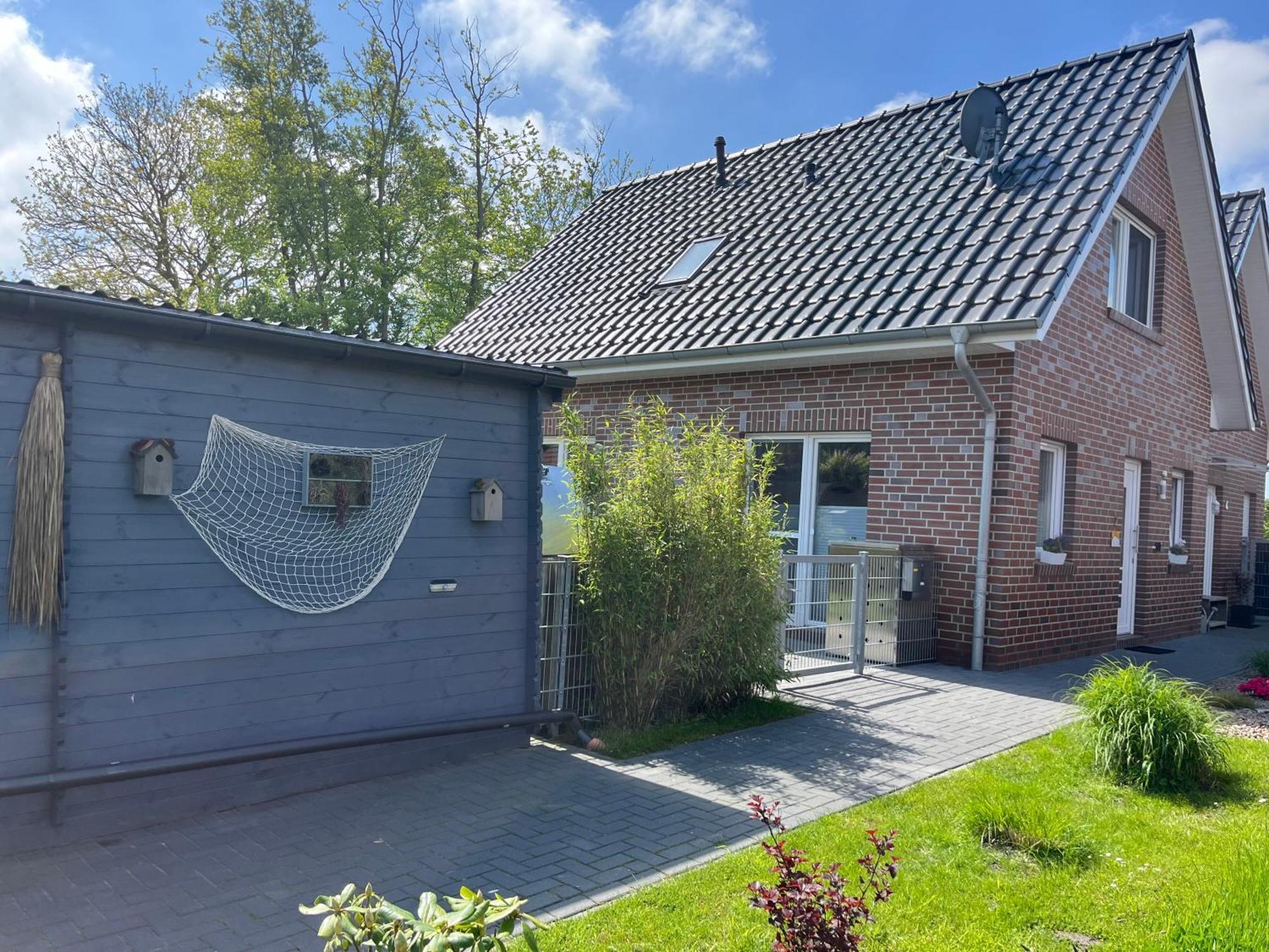 Haus Nordseeliebe Mit Aussensauna, Outdoor Dusche Und Wallbox Dornum Exterior photo